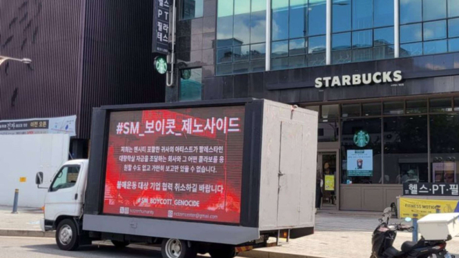 KNezt Beri Komentar Menohok Usai NCTzen Kirim Truk Boikot di Depan Toko Starbuck Korea